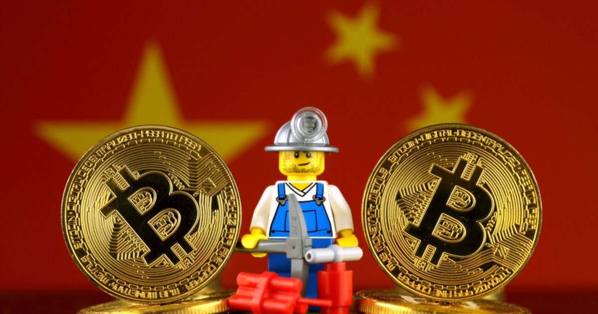 Two big bitcoin and a miner lego